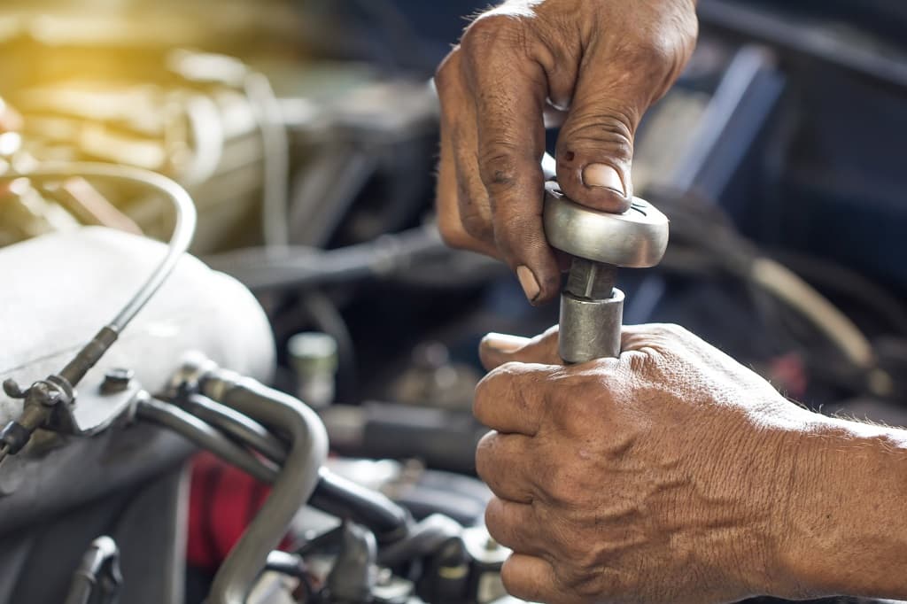 Repair things. Mechanic hand. Old man repairing Mechanical watch.